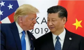  ??  ?? Donald Trump meets Xi Jinping in Osaka, Japan, in June 2019. Photograph: Kevin Lamarque/Reuters