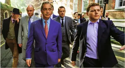  ??  ?? Below withnigel farage in westminste­r, the morning of the eu referendum result