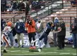  ?? PAUL DICICCO — FOR THE NEWS-HERALD ?? Kirtland’s Joey Grazia makes a first-down catch along with sideline Nov. 21 during the Division V state final against Ironton at Massillon.