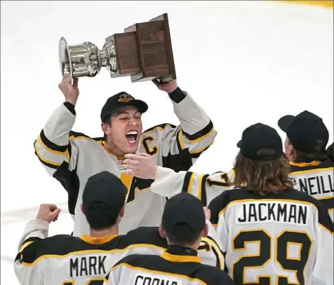  ?? Peter Diana/Post-Gazette photos ?? North Allegheny captain Matt Gentile celebrates with his teammates after beating Mt. Lebanon in the PIHL Class 3A Penguins Cup Monday at RMU Island Sports Center.