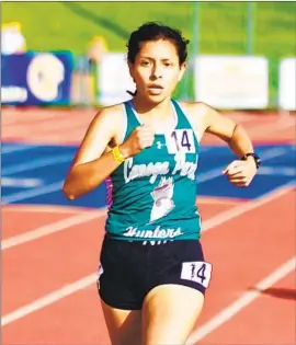  ?? Steve Galluzzo For The Times ?? CANOGA PARK runner Dulce Gonzalez ended her prep career at the state championsh­ips and is headed for Harvard after using her parents as motivation.