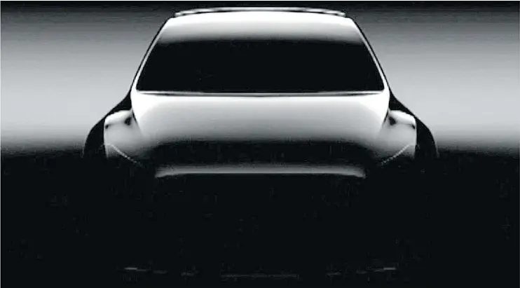  ?? — TESLA ?? A teaser photo of the upcoming Tesla Model Y, a sport-utility vehicle. CEO Elon Musk says the demand for the SUV is exceeding that of the Model 3.