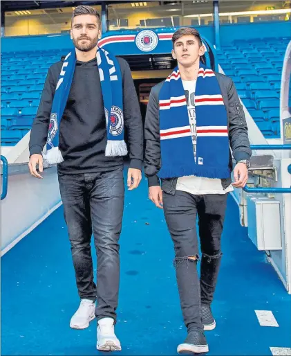  ?? Picture: SNS ?? WALKING THE WALK: New midfield signings Jon Toral (left) and Emerson Hyndman arrive at Ibrox yesterday.