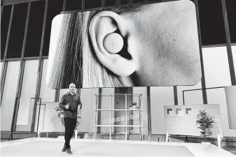  ?? Craig Ruttle / Associated Press ?? Rick Osterloh, senior vice president of devices and services at Google, speaks about Pixel Buds (displayed on screen) as this and other products were being announced in New York.