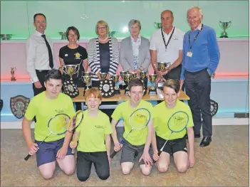  ??  ?? Left to right, back row, Oban High School head teacher Peter Bain, PE teacher Denise Gemmell, former PE teacher Moira Barbour, retired PE teacher Liz Clunie, ABCD’s Alfie MacKenzie and Andy Henderson, with members of Oban High School Badminton Club.