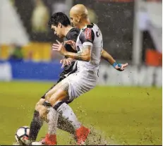  ?? | JORGE ADORNO/REUTERS ?? Gramado ficou pesado após forte chuva