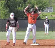  ?? Scott Herpst ?? LaFayette’s Nick Adams celebrates a double during the Ramblers’ home game with LFO this past Thursday. Adams finished with two doubles and three RBIs in the Region 6-AAA contest.