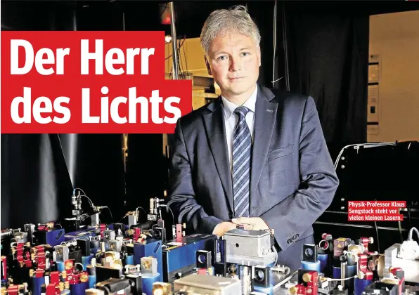  ??  ?? Physik- Professor Klaus Sengstock steht vor vielen kleinen Lasern.