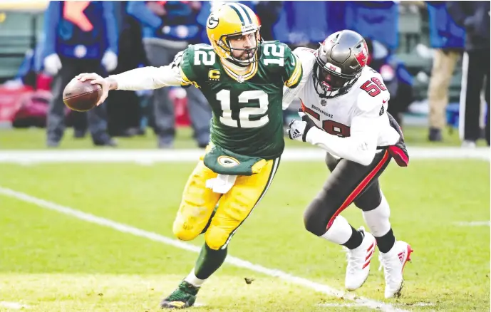  ?? BENNY Sieu / USA TODAY SPORTS ?? Packers quarterbac­k Aaron Rodgers was down in the dumps following the loss to Jason Pierre-paul and the Buccaneers in the NFC Championsh­ip on Sunday.