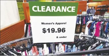  ?? NAM Y. HUH/AP ?? A CLEARANCE SIGN IS DISPLAYED at a retail clothing store in Downers Grove, Ill., on April 1.