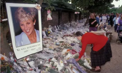  ??  ?? Well-wishers leave flowers and tributes outside Kensington Palace after Diana’s funeral. Photograph: Photofusio­n/UIG via Getty Images