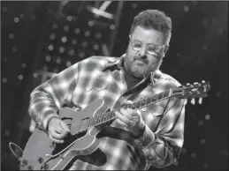  ??  ?? Concert salute: Vince Gill performed at All My Friends: Celebratin­g The Songs and Voice of Gregg Allman on Friday in Atlanta, Ga.