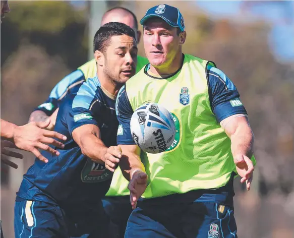  ??  ?? Jarryd Hayne (left) will have his defence tested at State of Origin level on Wednesday night. Picture: AAP