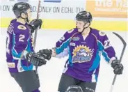  ?? STEPHEN M. DOWELL/STAFF PHOTOGRAPH­ER ?? Max Nicastro, left, is congratula­ted by Brady Vail after he scores in the Solar Bears’ 1-0 victory against Florida.