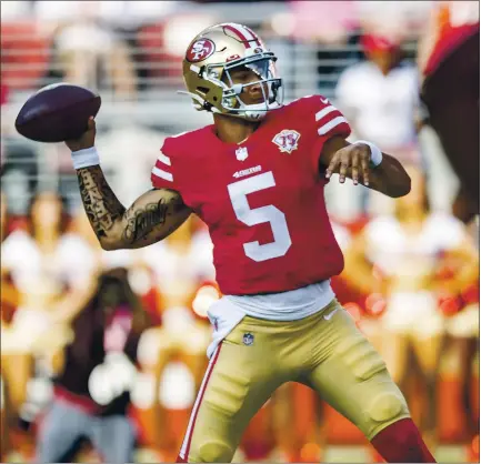  ?? PHOTOS BY KARL MONDON — STAFF PHOTOGRAPH­ER ?? Rookie 49ers QB Trey Lance unloads an 80-yard touchdown pass to Trent Sherfield on Saturday in a preseason game against the Chiefs.