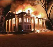  ?? Jerry Bearden via Associated Press ?? The Mason County Courthouse went up in flames the night of Feb. 4. An arson suspect is in custody.