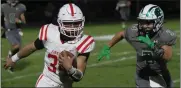  ?? RANDY MEYERS — FOR THE MORNING JOURNAL ?? Josh Kovach of Firelands picks up yards down the sideline and is chased by Columbia’s Marco Cirigliano during the first quarter in a game last season.