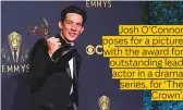  ??  ?? Josh O’Connor poses for a picture with the award for outstandin­g lead actor in a drama series, for ‘The Crown’.