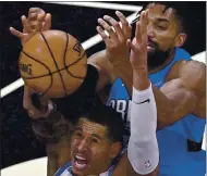  ?? PHELAN M. EBENHACK — THE ASSOCIATED PRESS ?? Warriors forward Juan Toscano-Anderson grabs a rebound in front of Orlando Magic center Khem Birch during a game last week.