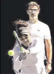  ?? REUTERS ?? Serena Williams sweats it out during practice under the watchful eye of her coach Patrick Mouratoglo­u.