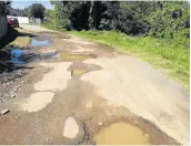  ??  ?? MUDDY HOLES: Boundary Road in Gonubie, identified as one of the worst in the suburb by ward councillor Andre Swart