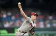  ?? NICK WASS — THE ASSOCIATED PRESS ?? Phillies starting pitcher Nick Pivetta delivers during the first inning Sunday night against the Nationals in Washington. There was a rain delay early in Sunday night’s game against the Nationals and it ended too late for this edition.