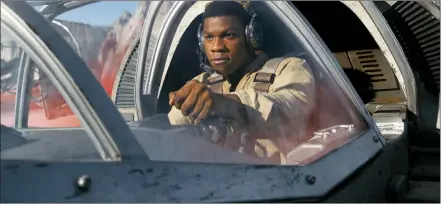  ??  ?? This image released by Lucasfilm shows John Boyega as Finn in a scene from “Star Wars: The Last Jedi.”