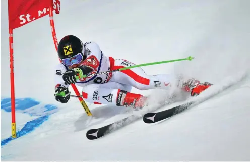  ?? Foto: AFP/Fabrice Coffrini ?? Erster nach zwei Läufen: Der Österreich­er Marcel Hirscher wurde am Freitag Weltmeiste­r im Riesenslal­om.