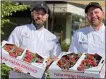  ?? SUBMITTED PHOTO ?? PJ Folk, right, executive chef at Harvest Seasonal Grill and Wine Bar in Harrisburg and sous-chef Greg Dietrich, right, with fresh strawberri­es.