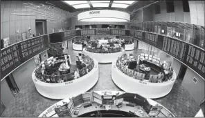  ?? AP/MICHAEL PROBST ?? Desks sit empty on the floor of the trading room at the German stock market in Frankfurt on Monday. The European Commission on Wednesday blocked a plan to combine the London Stock Exchange and Deutsche Boerse.