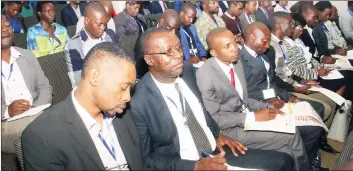  ??  ?? Delegates follow proceeding­s at the Zimpapers-organised Cyber Security Conference held in Harare yesterday. Picture by Kudakwashe Hunda