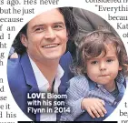  ??  ?? LOVE Bloom with his son Flynn in 2014