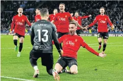  ?? REUTERS ?? Real Mallorca’s Sergi Darder celebrates with goalkeeper Dominik Greif after winning the penalty shoot-out.