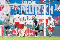  ?? REUTERS ?? Bayern’s Arjen Robben, second right, celebrates scoring their fifth goal.