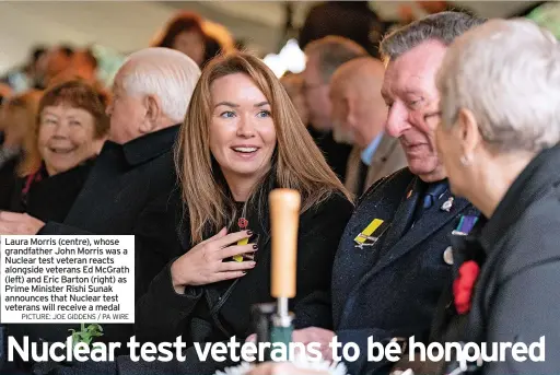  ?? PICTURE: JOE GIDDENS / PA WIRE ?? Laura Morris (centre), whose grandfathe­r John Morris was a Nuclear test veteran reacts alongside veterans Ed McGrath (left) and Eric Barton (right) as Prime Minister Rishi Sunak announces that Nuclear test veterans will receive a medal