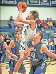  ?? Jan Wright ?? Hunter Holmes goes up in the lane for a shot against Trion this past Friday night. Gordon Lee would hang on late for a 42-38 victory in a Region 6-A battle.