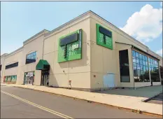  ?? Christian Abraham / Hearst Connecticu­t Media ?? The building that formerly housed Fairway Market at 699 Canal St. in Stamford. A year after the closing of the Stamford Fairway Market, many in the city, including mayoral candidates, would like to see another South End supermarke­t.