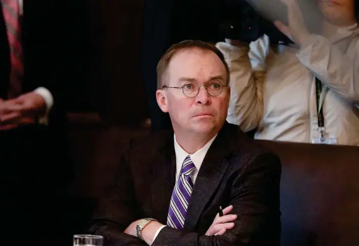  ??  ?? Mick Mulvaney in October. Mulvaney himself said in a press conference the White House had conditione­d military aid on investigat­ions in Ukraine. He later denied he had said that. Photograph: Leah Millis/Reuters