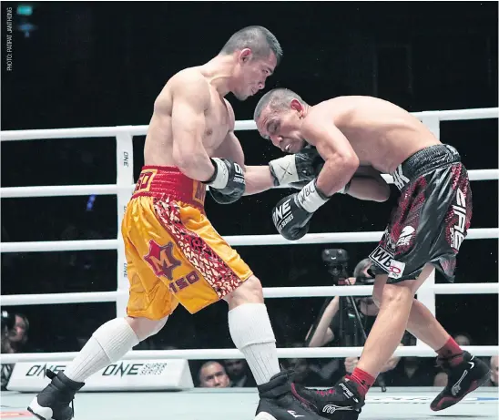  ??  ?? Srisaket Sor Rungvisai, left, in action against Iran Diaz at Muang Thong Thani.