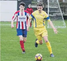  ??  ?? Jake Baldwin gets on the ball for Boro Under-15s