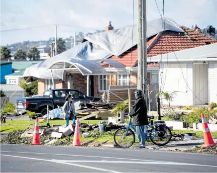  ?? Photos / Dean Purcell ?? Some 22 homes have been deemed unsafe to live in after last weekend’s tornado.