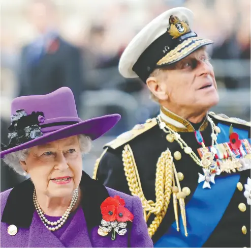  ?? ADRIAN DENNIS / AFP / GETTY IMAGES ?? Britain’s Queen Elizabeth II credits Prince Philip, her husband of nearly 70 years, for supplying her with constant love and help in her efforts to remain true to the idea of always listening to the people she leads.