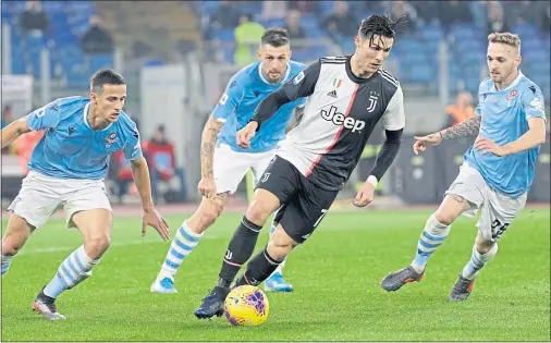  ??  ?? Cristiano Ronaldo in action for Juventus against Lazio, their closest contenders for the Serie A title