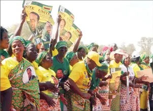  ??  ?? ZANU-PF supporters sing and dance as they await the arrival of the party’s First Secretary and President Cde ED Mnangagwa for a rally at Pfupajena Stadium in Chegutu last Friday. by Tawanda Mudimu — Picture