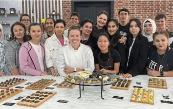  ?? Photos courtesy of Amanda Wright ?? Attendees of Amanda Wright's two-day chocolate workshop in Tashkent, Uzbekistan, created a chocolate bar using recipes for various fillings like caramel, marshmallo­w and ganache, and tips for casting molded chocolates.