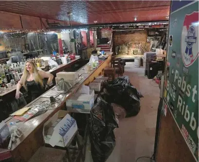  ?? AMY DAVIS/BALTIMORE SUN PHOTOS ?? Rachel Taft, who runs the nonprofit Feed the Scene, is overseeing renovation of The Sidebar. The cost of the major structural repairs needed to reopen the basement club is being paid through crowdfundi­ng from its many fans.