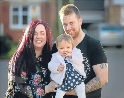  ?? Picture: Kris Miller. ?? Ashleigh and Gordon Bryce with daughter Layla who celebrated her first birthday yesterday.