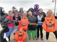  ??  ?? Porthcawl Parkrun marshals entered into the Halloween spirit last Saturday