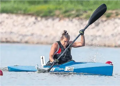  ?? CANOE KAYAK CANADA/CANOEPHOTO­GRAPHY.COM ?? Paralympia­n Brianna Hennessy got in a boat for the first time a year ago. Now she’s competing in Tokyo.