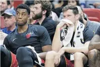  ?? LYNNE SLADKY/AP ?? Hassan Whiteside, left with Goran Dragic, has yet to play more than 29 minutes since his return from an injury.